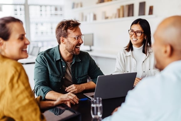 Client meeting with people smiling