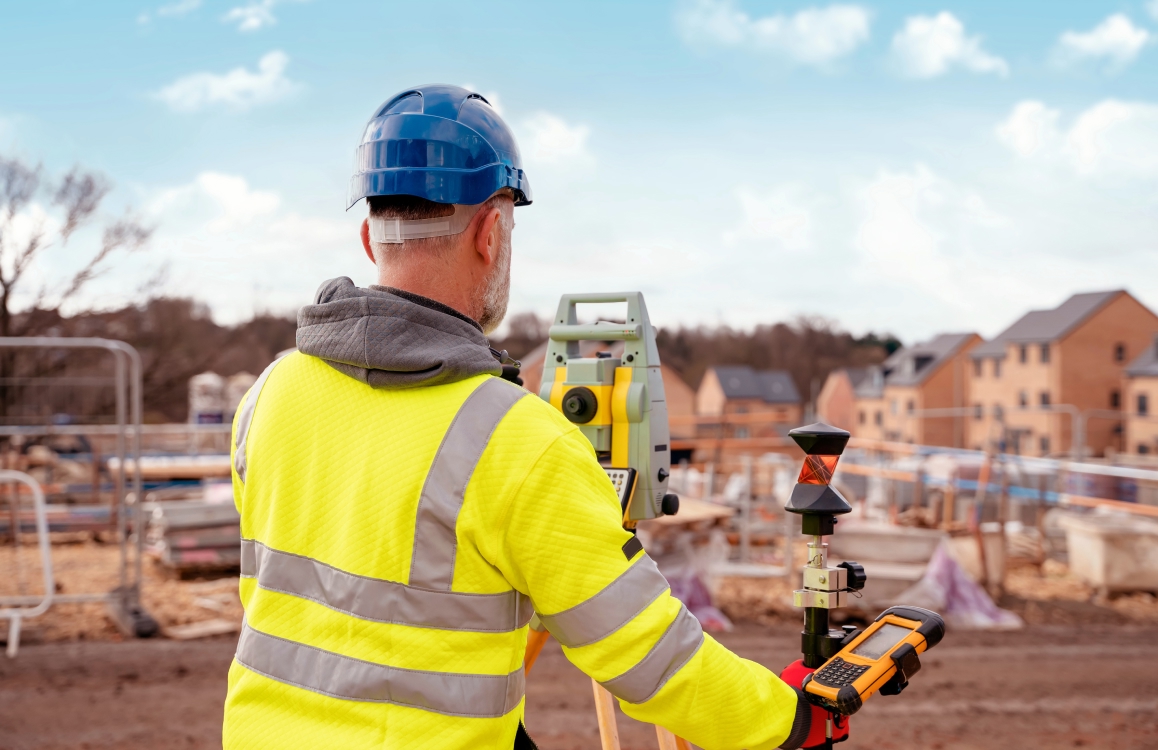 Surveyor on new house build site
