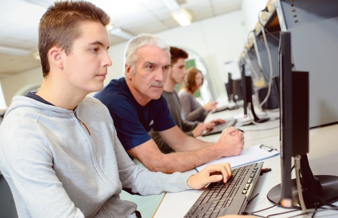 IT Apprentice working on computer