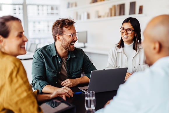 About-Carousel-A-Group-Laughing-In-A-Meeting