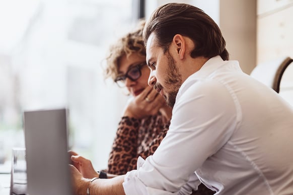 About-Carousel-Two-People-Talking-At-Work